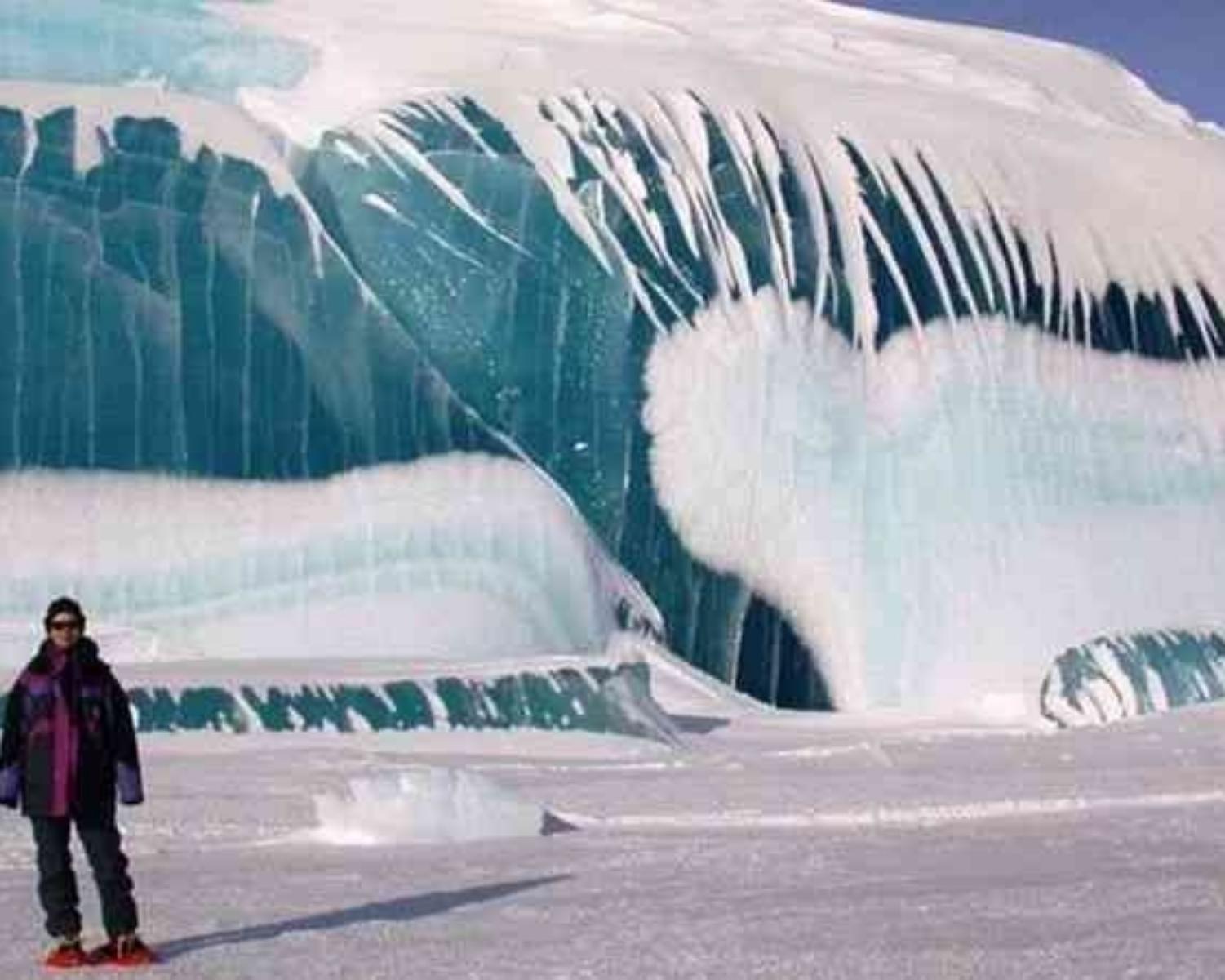 5. The 'Frozen Waves' in Antarctica that make you pause in time.